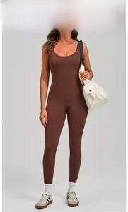 Close-up of brown backless yoga bodysuit with high-stretch fabric and athlete styling