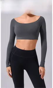 Charcoal grey off-the-shoulder long sleeve yoga crop top showing model fit and fabric