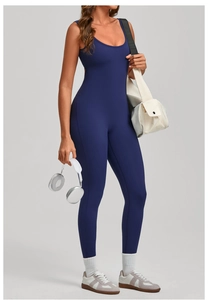 Detail of navy blue sleeveless one-piece yoga jumpsuit with tight fit and elastic fabric