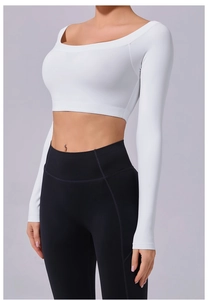 Close-up of the breathable high-stretch fabric and neat stitching on white yoga top