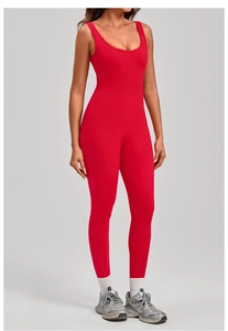Close-up of red backless yoga bodysuit showing slim fit high elasticity fabric detail