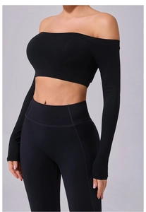 Close-up of black off-shoulder long sleeve yoga top and high waist leggings set