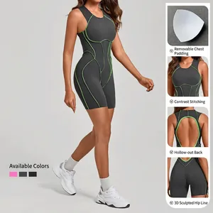 Combinaison de sport femme gris foncé avec coutures néon contrastées et dos ouvert