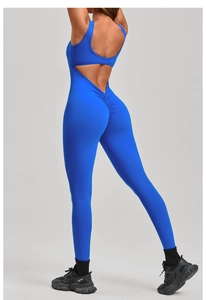 Detail of royal blue backless yoga jumpsuit with V-cut waist and ruched butt lift design