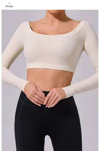 Detail of the cream off-shoulder long sleeve yoga top featuring high elastic fabric