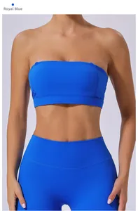 Vue de face de l'ensemble de yoga bleu roi avec haut bandeau et legging taille haute
