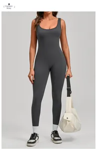 Close-up of charcoal grey yoga jumpsuit with high-elastic fabric and backless detail