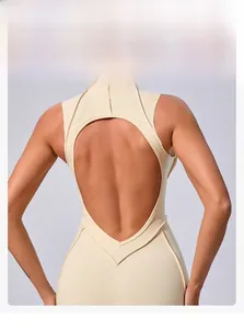 Detail of cross-back yoga bodysuit featuring heart-shaped cutout and open back design