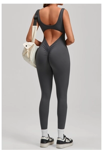 Detail view of backless dark gray jumpsuit with V-waist and scrunch butt lifting design