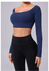 Detail of navy blue long sleeve off-shoulder yoga top with professional moisture-wicking fabric