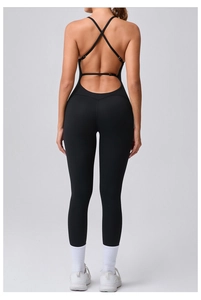 Detail of cross-strap back design on black athletic yoga bodysuit with slim fit cut