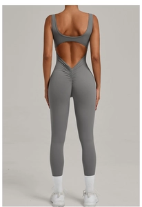 Detail of scrunch butt seam and backless cutout on grey yoga bodysuit