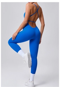 Detail of royal blue yoga jumpsuit showing cross straps and backless sculpting design
