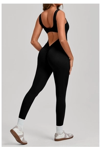 Detail view of the back V-cut out and scrunch butt lifting design on black yoga bodysuit