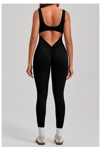 Detail view of the backless V-waist and scrunch butt design on black yoga bodysuit