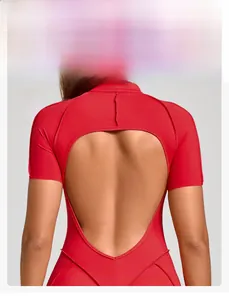 Close-up of red athletic bodysuit featuring a unique heart-shaped cutout on the back