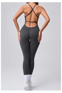 Detail view of charcoal grey backless bodysuit with adjustable cross straps and open back
