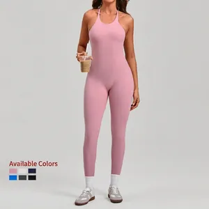 Pink one-piece yoga jumpsuit with adjustable straps and open back for fitness