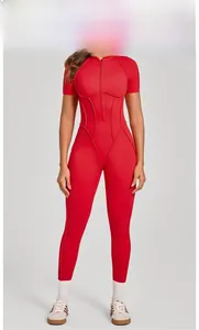 Detail view of red short sleeve yoga bodysuit with zipper collar and athletic fit