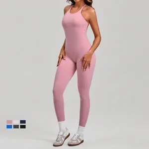Pink backless yoga bodysuit with adjustable straps for women, athletic fitness wear