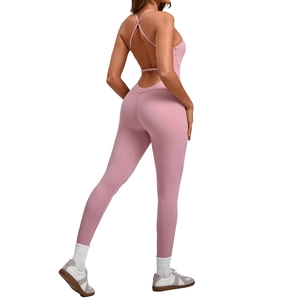 Pink backless yoga bodysuit with adjustable straps and cross-back detail for fitness