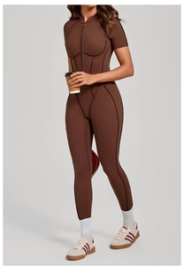 Detailed view of dark brown yoga catsuit with stand collar and functional zipper design