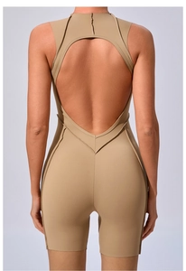 Close-up back view of u-shaped backless yoga jumpsuit in earthy khaki color fabric