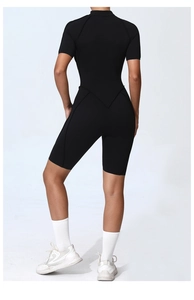 Back view of black high-elastic short sleeve yoga romper with triangle seam detail