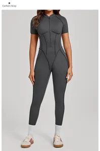Detail of dark charcoal gray yoga bodysuit featuring a stand-up collar and front zipper