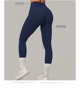 Vue détaillée du legging de yoga bleu marine à taille haute avec coutures sculptantes