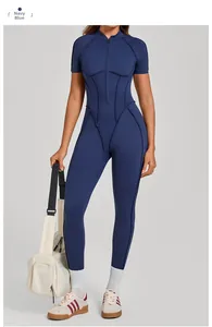 Detail of navy blue high-neck bodysuit with structured paneling for body shaping