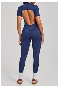 Deep blue yoga bodysuit featuring short sleeves and a large heart-shaped open back detail