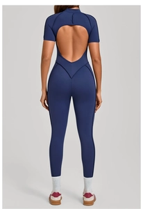 Rear view of tight fitness jumpsuit with stand collar, open back and triangle sewing details