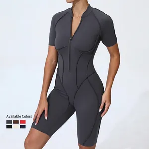 Slim fit short sleeve yoga jumpsuit with front zipper and athletic contour lines in dark grey