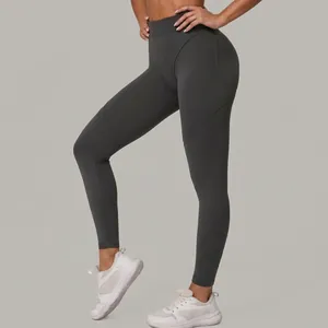 Leggings de yoga gris foncé à taille haute avec coutures sculptantes pour le fitness et course