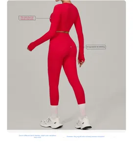 Detail of red athletic set featuring reinforced stitching and pad-free long sleeve top