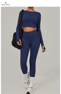 Detail of navy blue slim fit yoga set with thumbhole sleeves and high waist leggings