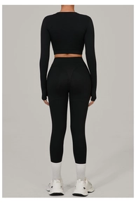 Rear view of black compression yoga set with flattering glute seams and slim fit design