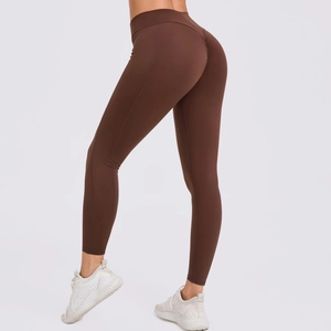 Detail van de yoga legging met hoge taille, push-up design en elastische sportieve stof