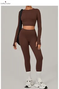 Detail of coffee brown gym set with thumbhole sleeves and high-waist fitness leggings