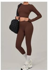 Coffee brown yoga set featuring a long sleeve crop top and high waist leggings detail