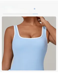 Detail of light blue square neck athletic dress with white contrast piping trim