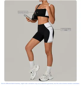 Detail view of contrast binding and removable pads on black and white yoga set