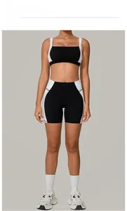 Detailed view of backless black and white patchwork yoga set with high waist shorts