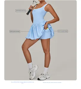 Detail of light blue tennis dress with built-in pocket for ball and pleated skirt hem