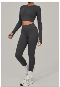 Detail of charcoal yoga set showing thumbhole cuffs and slimming contour seams