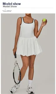 Ivory white backless tennis dress with black piping and pleated skirt for sports