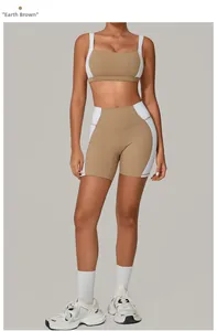 Detail view of earth brown and white colorblock backless yoga set with high-waist shorts