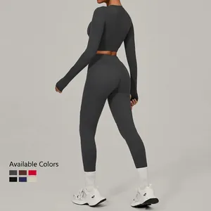 Women tight-fit thermal yoga set featuring high-waist leggings and long sleeve cropped top