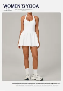 Detailed full-body view of a white halter-neck tennis dress with a pleated skirt and racerback